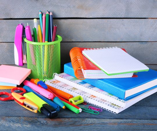 Colorful,Stationery,On,Wooden,Background